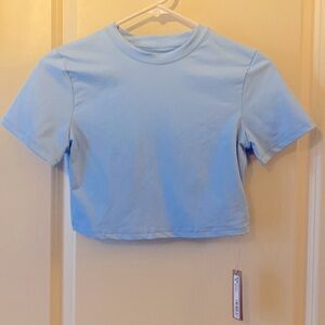SKIMS NWT SIGNATURE SWIM T-SHIRT SIZE MEDIUM-Iris Blue